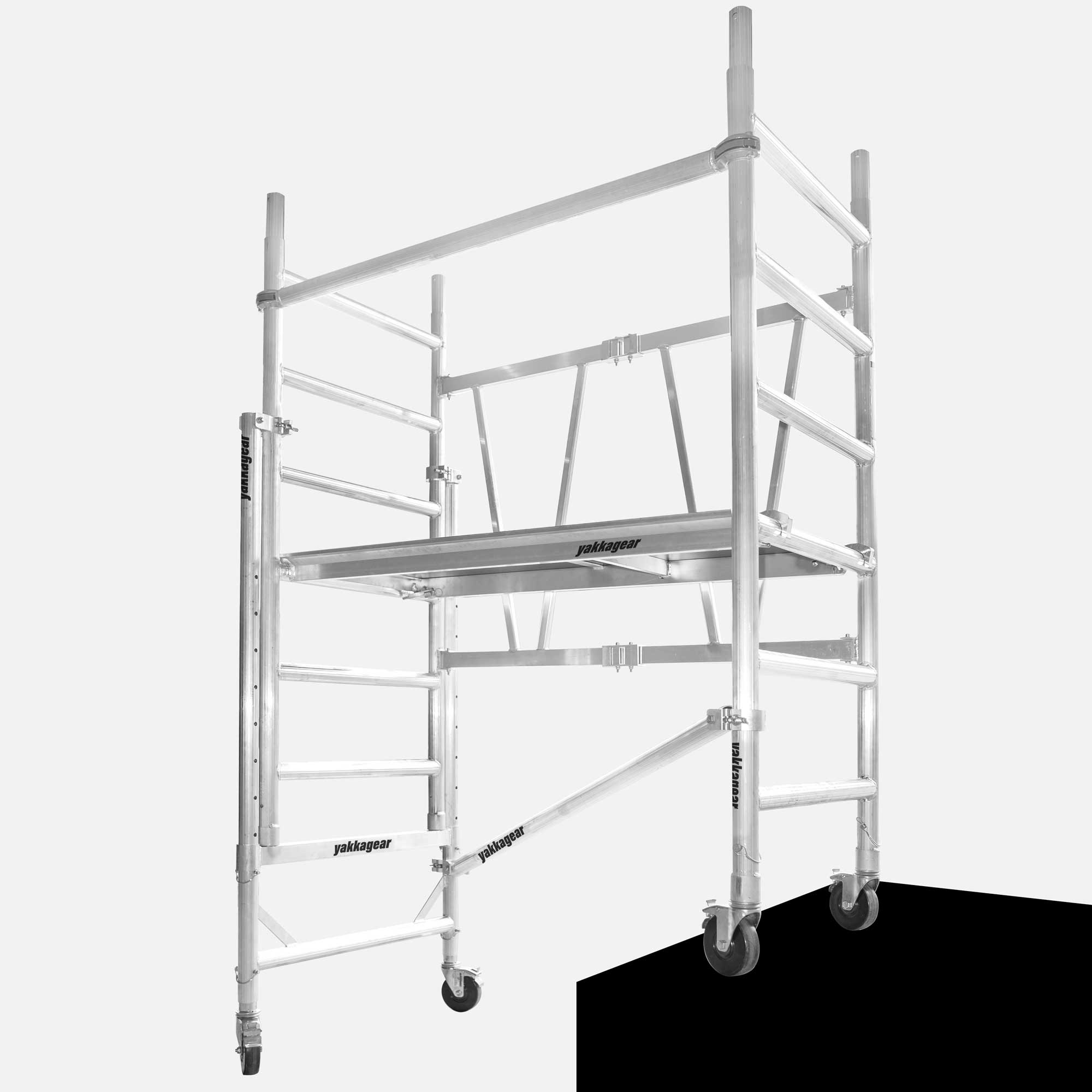 Yakka Gear Australia Adjustable Stairs toolkit used on 1.44m Length x 0.74m Width compact scaffolding tower as access equipment, with working platform heights ranging from 1.2m to 3.9m and reach between 3.25m to 6m, zoomed in detailed view of the stairs toolkit with the rest of the scaffold, with white background. 