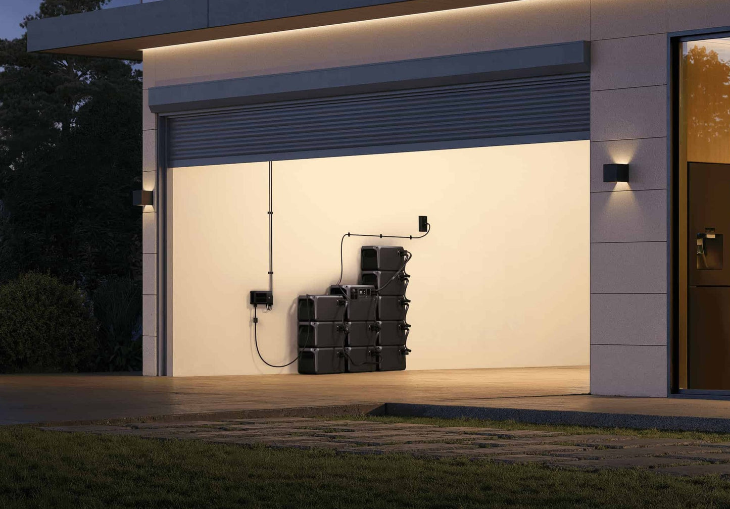 DJI Power 2000 stacked with DJI Expansion 2000 units in a home garage — heavy-duty portable power solution for tradies, construction sites, and DIY projects; scalable up to 10 units and sold by Yakka Gear.