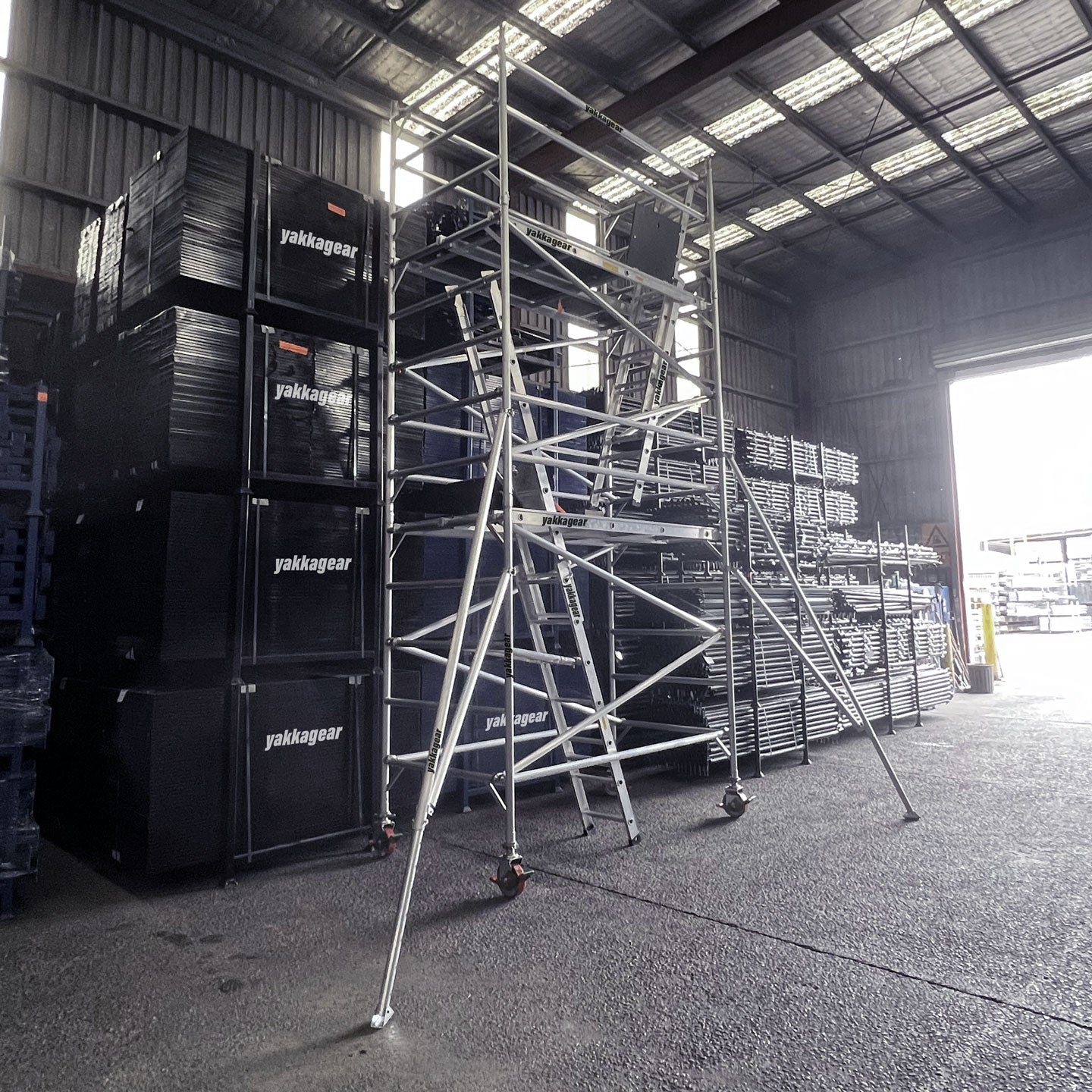 6.6m Reach (4.6m Platform) Aluminium Wide Mobile Scaffolding 2.5m x 1.3m | Yakka Gear - warehouse demonstration - left