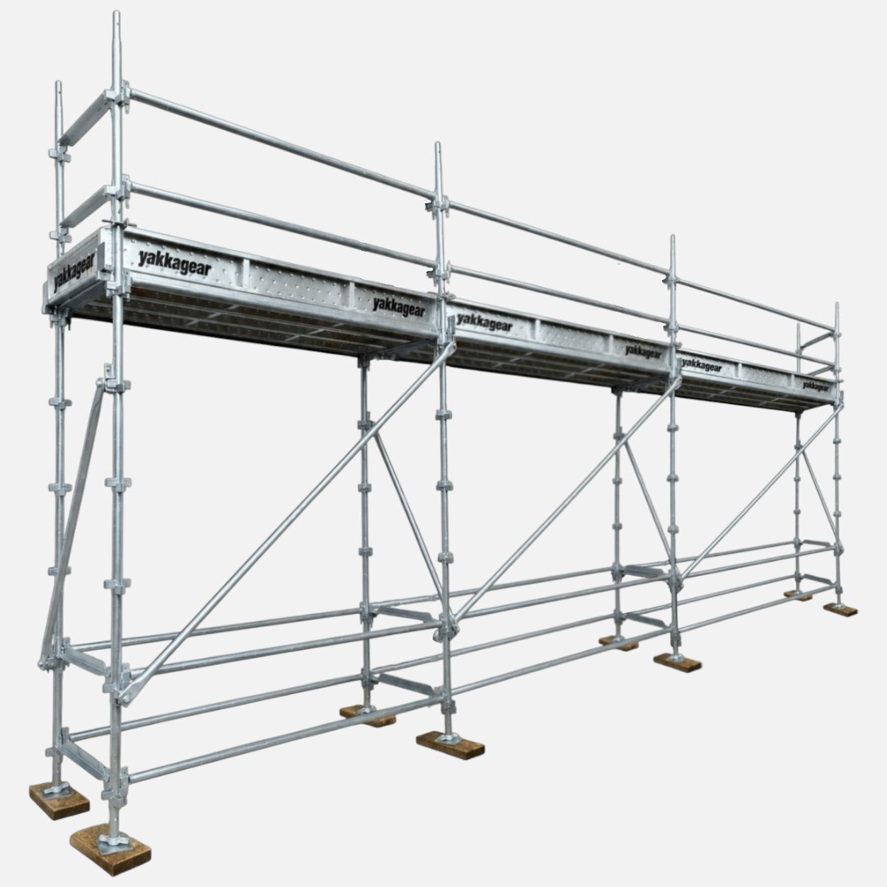 Yakka Gear 5m reach slim Kwikstage Scaffolding system in galvanised steel, featuring a 3m platform height, 7.2m overall length and 0.7m slim width, with multiple scaffold bays, guardrails, diagonal bracing, adjustable base jacks and Yakka Gear branded components, designed for construction and elevated access applications across Australia.