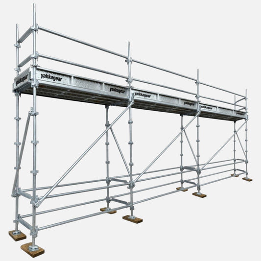 Yakka Gear 5m reach slim Kwikstage Scaffolding system in galvanised steel, featuring a 3m platform height, 7.2m overall length and 0.7m slim width, with multiple scaffold bays, guardrails, diagonal bracing, adjustable base jacks and Yakka Gear branded components, designed for construction and elevated access applications across Australia.