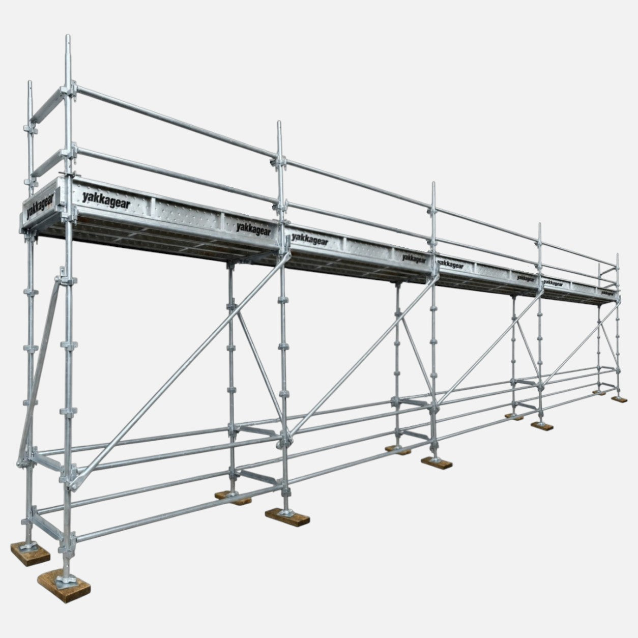 Yakka Gear 5m reach slim Kwikstage Scaffolding system in galvanised steel, featuring a 3m platform height, 9.6m overall length and 0.7m slim width, with multiple scaffold bays, guardrails, diagonal bracing, adjustable base jacks and Yakka Gear branded components, designed for construction and elevated access applications across Australia.