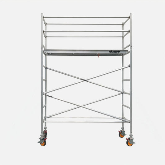 Yakka Gear 5m reach slim mobile scaffold tower Aluminium, featuring a 3m platform height and 0.7m slim width, with Yakka gear branded deck, safety guardrails, cross bracing, lockable castor wheels and stabiliser outriggers for elevated access and constriction work across Australia.