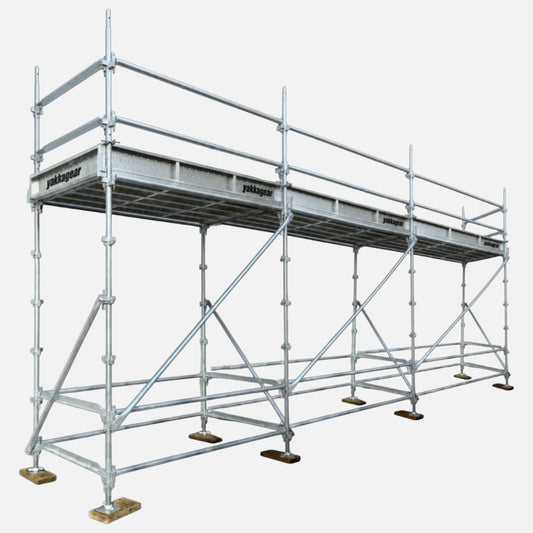 Yakka Gear 5m reach wide Kwikstage Scaffolding system in galvanised steel, featuring a 3m platform height, 7.2m overall length and 1.3m wide working platform, with guardrails, diagonal bracing, adjustable base jacks and Yakka Gear branded components, designed for safe elevated access on construction and building projects across Australia.