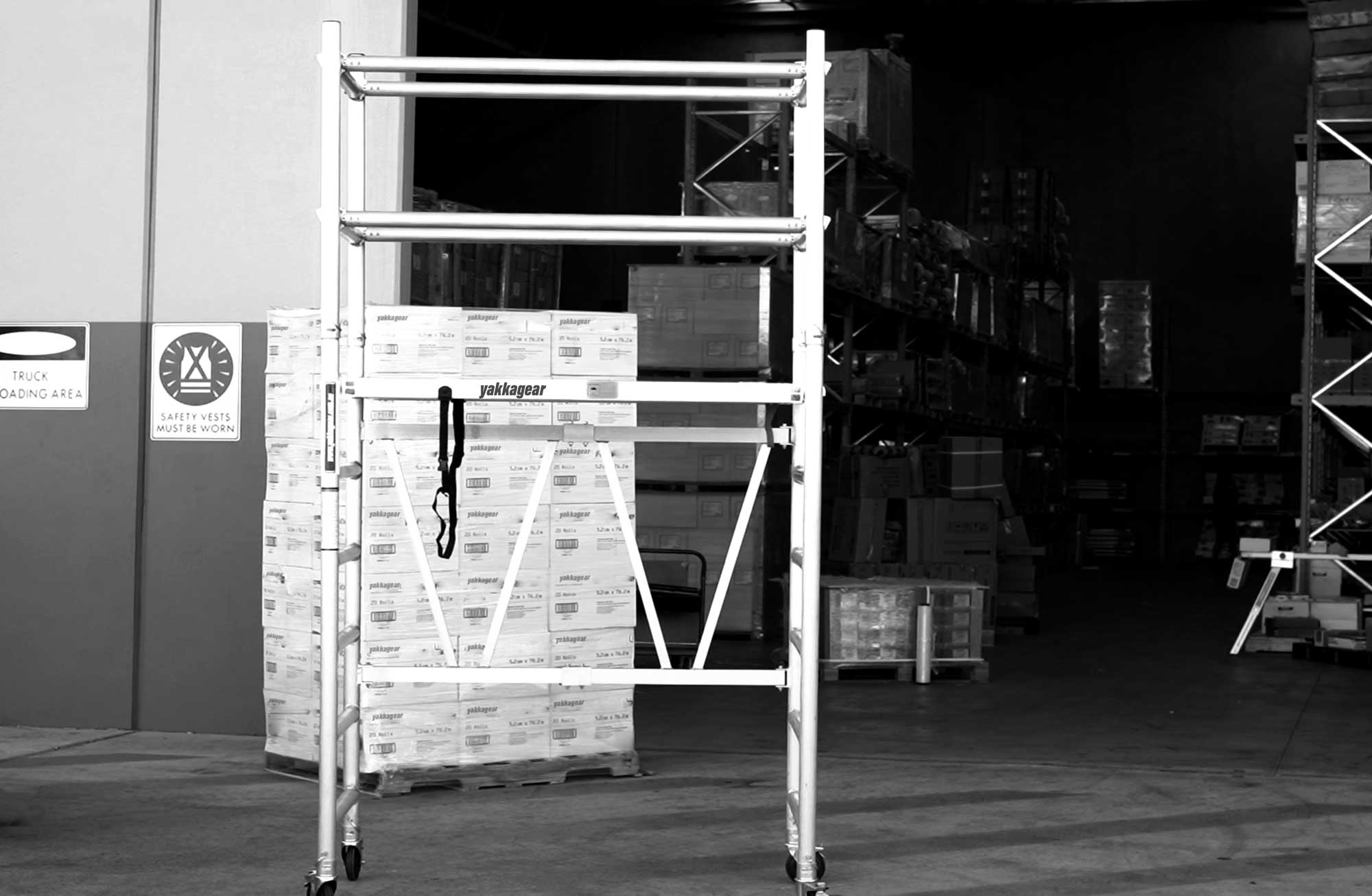 Yakka Gear Australia Base Unit and Extension Unit, 1.44m Length x 0.74m Width, with working platform height of 1.8m and reach up to 3.8m high. View from the front side angle set up in the warehouse.