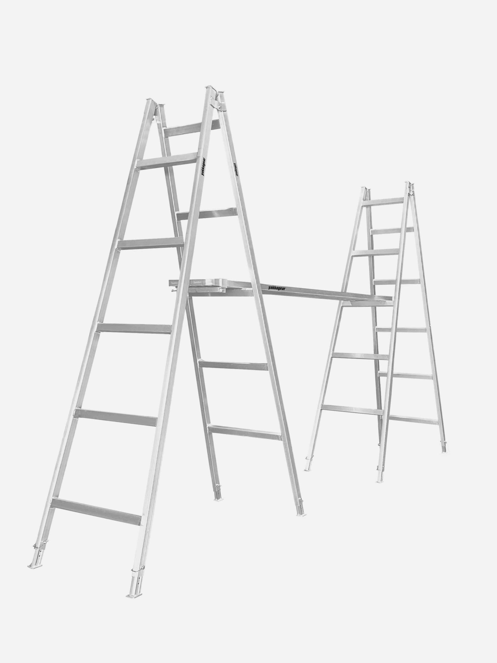 Aluminium planks positioned on adjustable aluminium trestles against a white background, forming a stable elevated platform. Commonly used by Australian tradies for tasks like painting, cladding, rendering, and general construction. The setup features anti-slip planks with removable end caps and height-adjustable trestles for flexible, on-site access. Plank Clamps are used to securely join two planks together, improving overall stability and reducing flex during use.