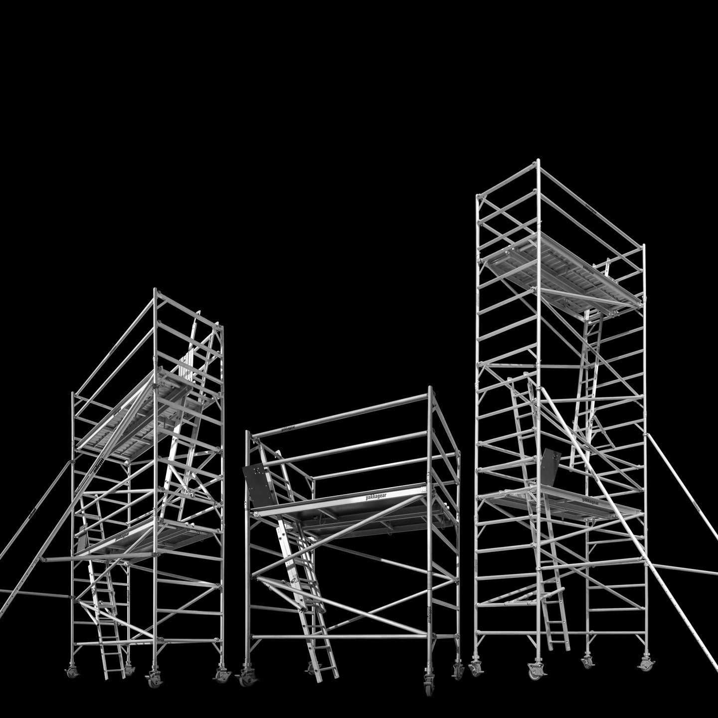 Yakka Gear Australia 2.5m Length 1.3m Wide 4.6m, 6.6m, and 8.6m reach wide scaffolding tower access equipment with working height of 2.6m, 4.6m, and 6.6m, view from the front angle, with black background. 